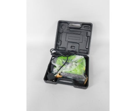A Lime electric jigsaw, model SSTV:7870, in original packaging, in outer case, and additional blades.