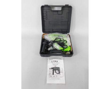 A Lime Impact drill, model SSTV:7867, in original packaging, within outer case, and an extension lead, (2).