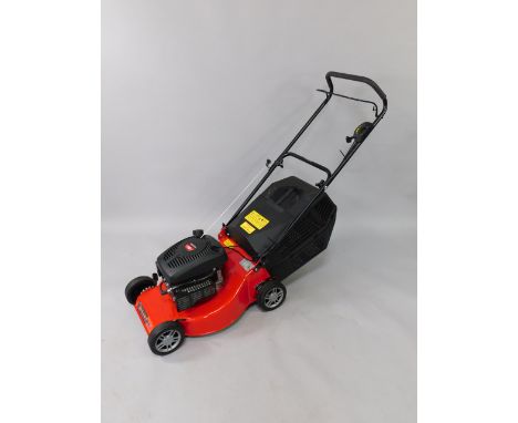 A Champion petrol lawnmower, in red, 46cm, model 40.