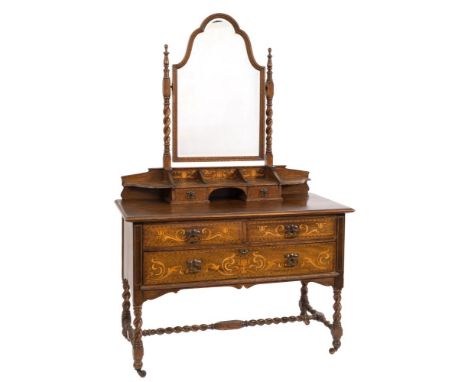 By Shapland and Petter, Barnstaple - An Edwardian oak and marquetry wardrobe and matching dressing table:, decorated with Art