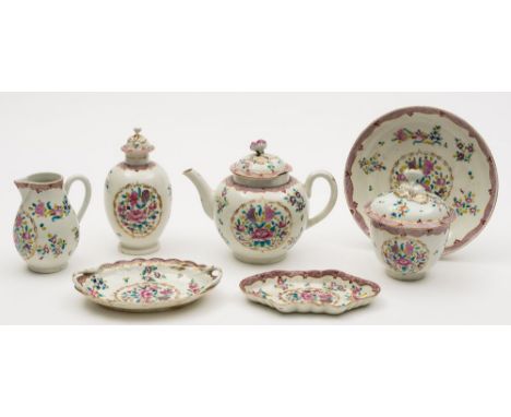 A First Period Worcester part tea service: decorated in the Chinese export style in famille rose colours with a large floral 