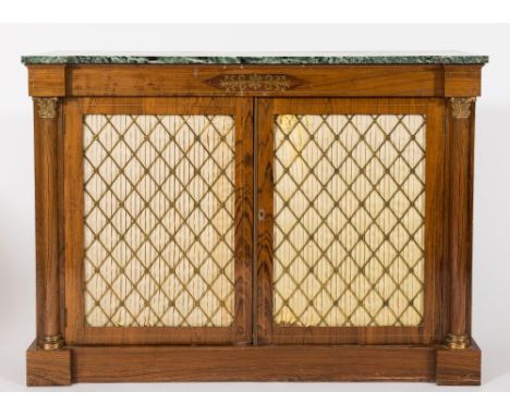 A pair of rosewood and brass inlaid breakfront side cabinets in the Regency taste:, each surmounted by a panel of green varie