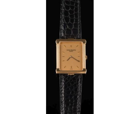 Patek Philippe. A gentleman's 18ct gold Patek Philippe dress wristwatch: the rectangular dial 30mm long x 24mm wide and with 