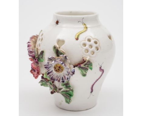 A Mennecy pot-pourri vase: of baluster form, painted with insects and applied with flowers and foliage, circa 1760, 8.5 cm hi