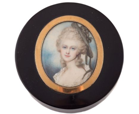 An 18th/19th Century circular tortoiseshell and gilt metal box, the lid inset with a miniature portrait of a lady after Richa