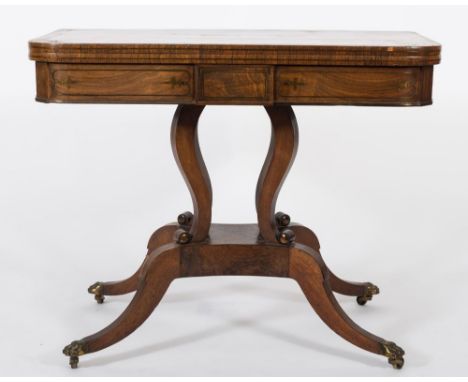 A Regency rosewood and brass inlaid rectangular card table:, bordered with lines and decorated with fleur de lys designs, the