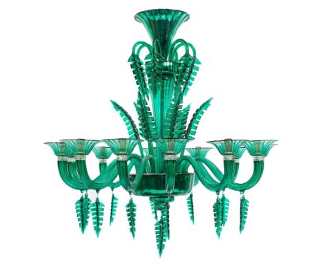 A Barovier & Toso (Murano) green glass chandelier and twenty matching side lights: the former with twelve scrolling branches 