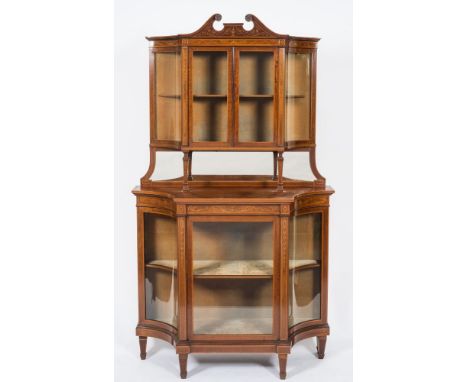 An Edwardian mahogany and marquetry display cabinet:, banded in satinwood, bordered with boxwood and ebony lines and decorate