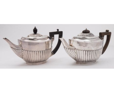 A late Victorian silver teapot, maker West & Son, London, 1896: initialled, of oval outline with half-reeded decoration,  and