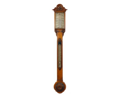 Lilley & Sons, London, a carved oak stick barometer: the bone dial aslant for 10 A.M. Yesterday Corrected to the left-hand di