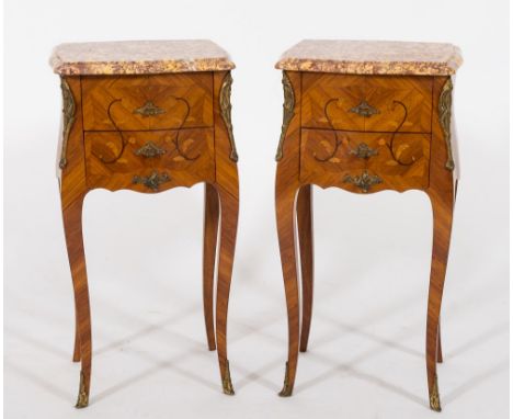 A pair of French tulipwood, floral marquetry and gilt metal mounted bombe petit commodes:, each surmounted by a panel of brec