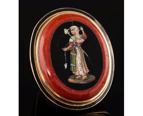 A 19th century black enamelled gold and micro mosaic oval panel ring:, the heliotrope oval panel with inner black onyx and mi