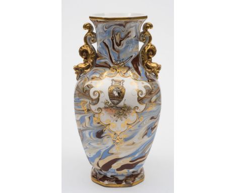 An Ironstone agate ware vase: of octagonal profile, the baluster body with gilt dolphin handles, decorated front and verso wi