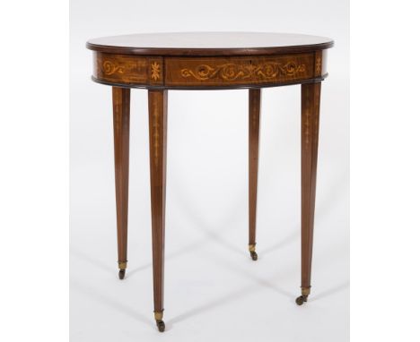 By Edwards and Roberts - An Edwardian mahogany and marquetry oval occasional table:, the top with a central panel of twin fan