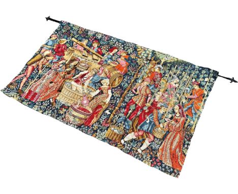A 15th century style wall tapestry scene of wine making, the harvest, crushing of the grapes, etc, hung on a steel rod, 200cm