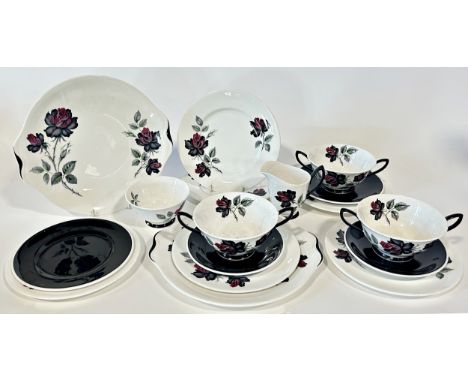 A large quantity of Royal Albert Masquerade pattern tea and coffee comprising, cups, saucers, one coffee pot, two tea pots, e
