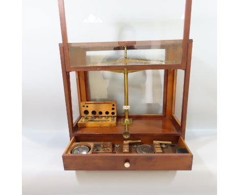 A pair of Oertling chemist's scales, with a box of weights