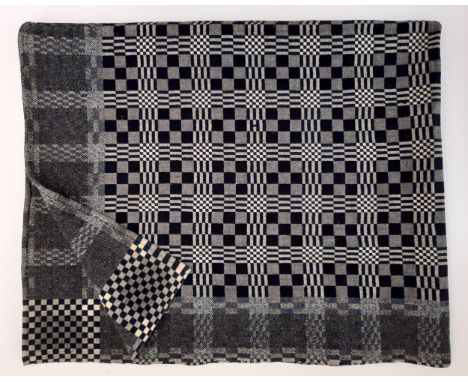 Welsh woollen blanket in reversible double weave, woven on a narrow loom in 2 sections joined with centre seam. In grey, navy