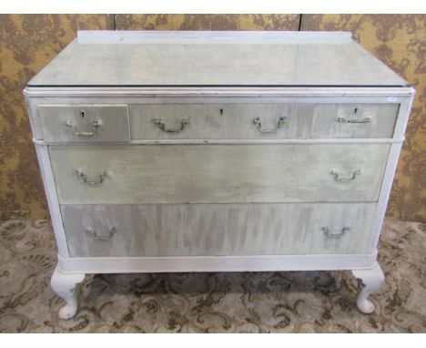 A bedroom chest in the Georgian style fitted with three short and two long drawers on cabriole supports with painted finish, 