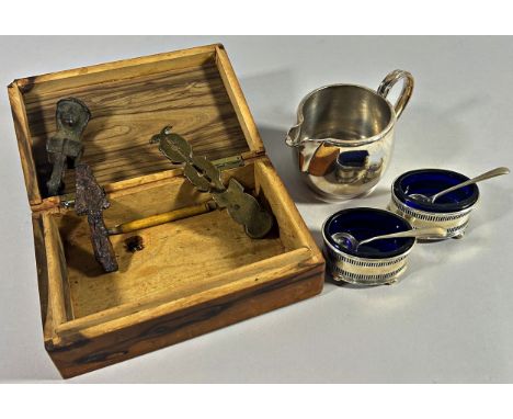 A Haff planimeter, 18th century sovereign scale, a pair of silver salts with spoons a wooden box, a milk jug, an ancient iron