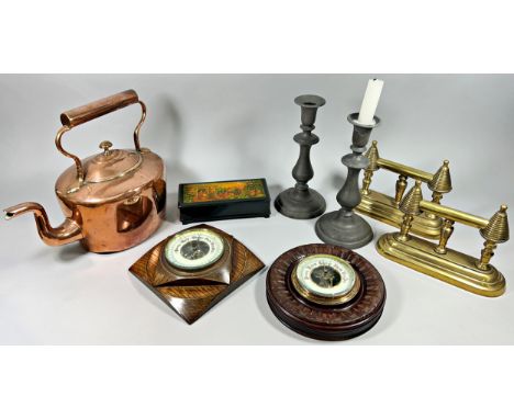 A 19th century Copper kettle, a pair of fire iron rests, two barometers, a pair of pewter candlestick and a Russian trinket b