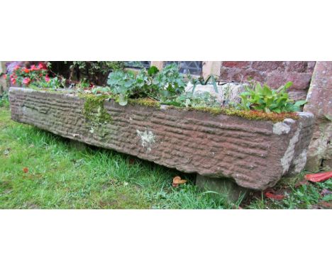 A large carved natural stone three divisional trough/planter of low rectangular form, 20cm high x 153cm long x 37cm wide