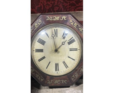 A 19th century rosewood and brass inlaid wall clock, of octagonal form with 9” dial.