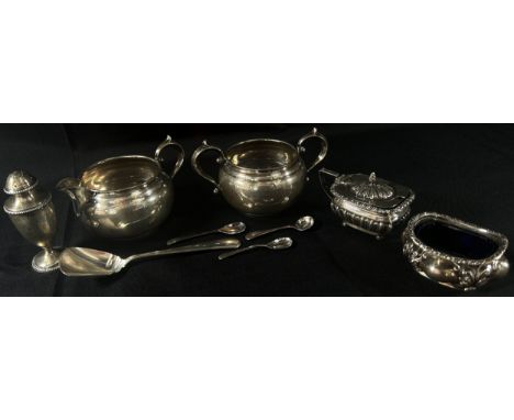 A selection of silverware including a sugar bowl, milk jug, caddy spoon, pepper pot, condiments and a spoon, 10.6 oz