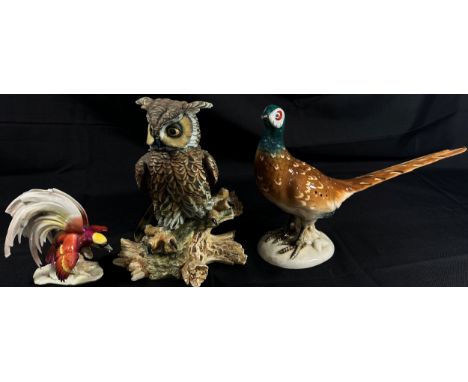 A large collection of mixed Continental and other ceramics to include tea and coffee wares, models of birds, an owl, a porcel