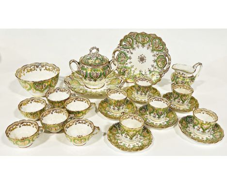 19th century green and gilt part tea service comprising cups and saucers (2 shapes) dishes, sugar basin, slop bowl etc