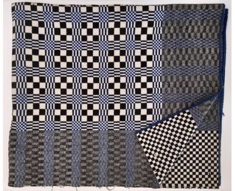 Welsh woollen blanket in reversible double weave, woven on a narrow loom in 2 sections joined with centre seam. In blue, blac