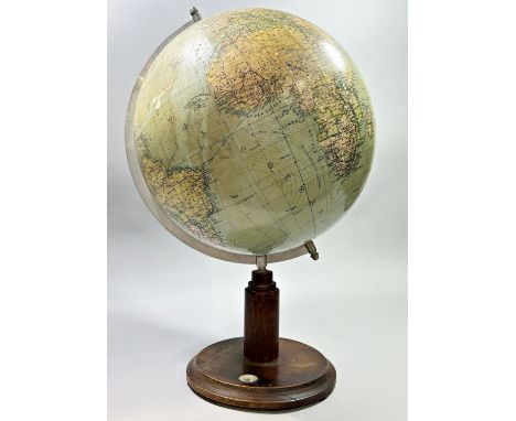A Terrestrial World Globe on a wooden stand incorporating a small compass 53cm high approximately (worn in places) 