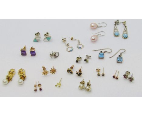 Mixed collection of gem set earrings to include a pair of 9ct amethyst studs, a pair of 9ct ruby and pearl drops with clip fa