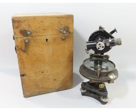 An E R Watts &amp; Son Vintage Theodolite incorporating a compass, housed in its original wooden box.