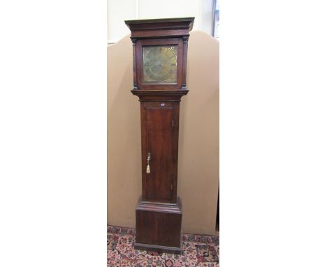 An early Georgian oak longcase clock by with square brass dial and 30 hour movement by William Bunch of Bramshott, with weigh