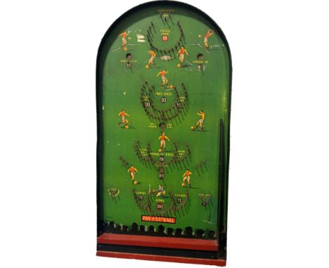 An Association Football 'Pin Football' bagatelle board with four ball bearings. 