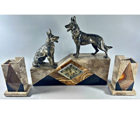 A large early 20th century continental onyx and marble clock garniture in the Art Deco style, the clock with lozenge dial and