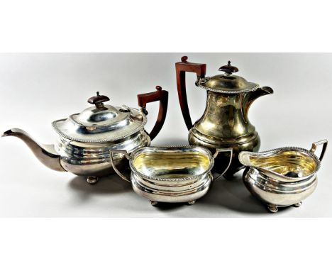 A Georgian style silver four piece tea and coffee service, with a jug and sugar bowl, Birmingham, 1937, makers mark Adie Brot