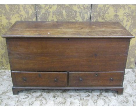 A Georgian elm and oak mule chest with hinged lid over two drawers set on bracket feet, 74 cm high x 132 cm long x 56 cm deep