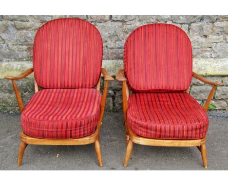 A pair of vintage Ercol open elbow chairs with beech frames and loose cushions 76cm H x 70cm W x 90cm D 