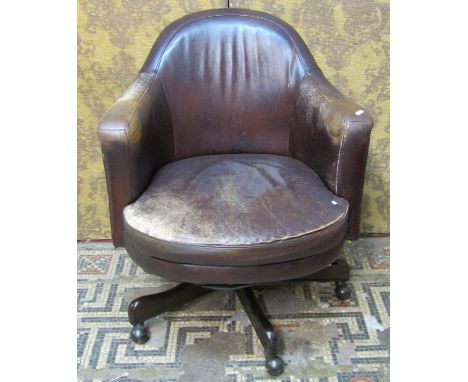 A vintage style swivel office desk chair 