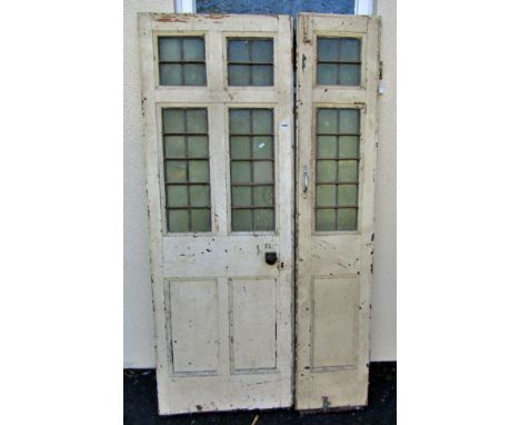 An unusual Georgian pine entrance door in two parts (two thirds/one third) with leaded light panels, overall width 103cm appr