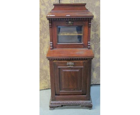 An Edwardian walnut pedonium with unusual raised section with glazed panel door, 98cm high x 43cm x 38cm