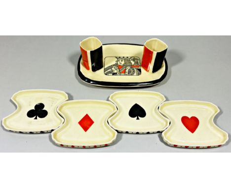 A Royal Doulton novelty Art Deco playing card suit bridge set, containing four shaped dishes centred with card suits, flanked