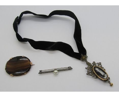 Victorian white metal locket pendant with oval monochrome enamel portrait of a girl, hung from a velvet choker, together with