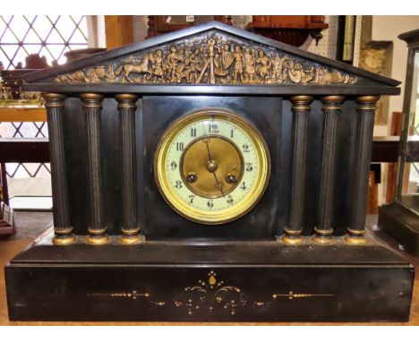 A Victorian polished black slate mantle clock of classical architectural / portico form, 30 x 42cm.