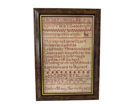 A 19th century orphanage tapestry sampler by Emily Mary Ferris, aged 10, with religious verse and alphabet in different fonts