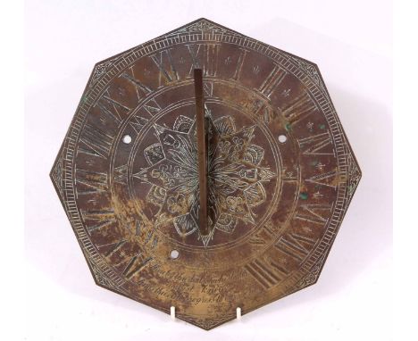 Late 19th century brass sundial of octagonal form with outer chapter ring with engraved Roman numerals and inner track with p