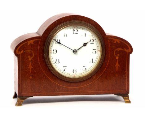 Mid-20th century mahogany and inlaid mantel timepiece, the shaped case with inlaid foliate detail and raised on four cast and
