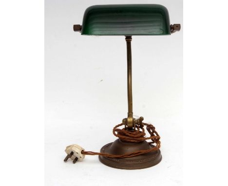 Desk lamp with solid green glass shade and brass fittings 